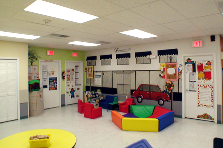 A room with many colorful furniture and toys.