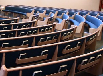 A bunch of seats in the middle of a room