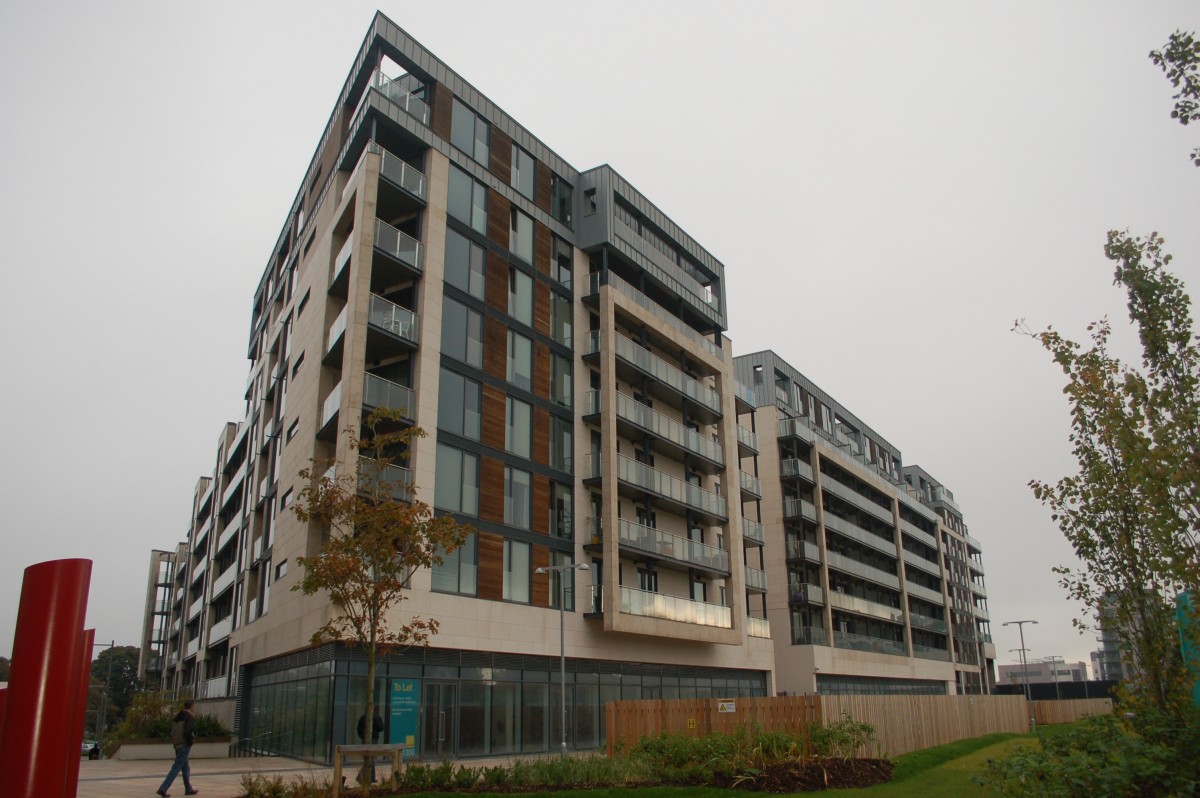 A large building with many windows and balconies.