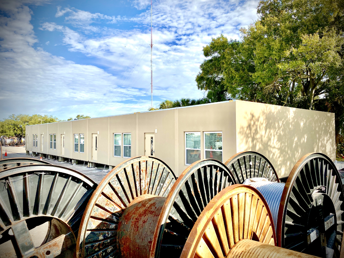 A group of large metal wheels sitting next to each other.