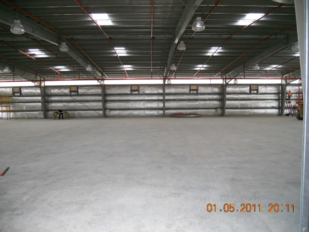 A large empty warehouse with no people in it.