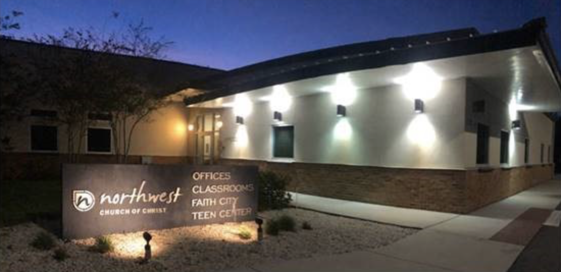 A building with lights on the outside of it